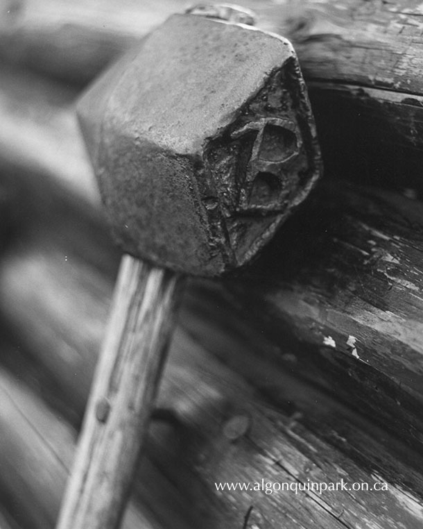 Image: J.R. Booth left his mark on more than just logs in the forests of his timber limits. His legacy had a far-reaching impact on the lives of average Canadians as well as the Algonquin Park we know today. Stamping hammer from the J.R. Booth Company, photographed October 28, 1970. APPAC, APM 638. 