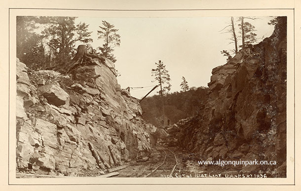 Image: Men working on blasting and clearing a rock cut at Islet Lake, 1896, during construction of the Ottawa, Arnprior and Parry Sound Railway. APPAC, 1976.86.1-54, Photographed by John Walter Le Breton Ross.