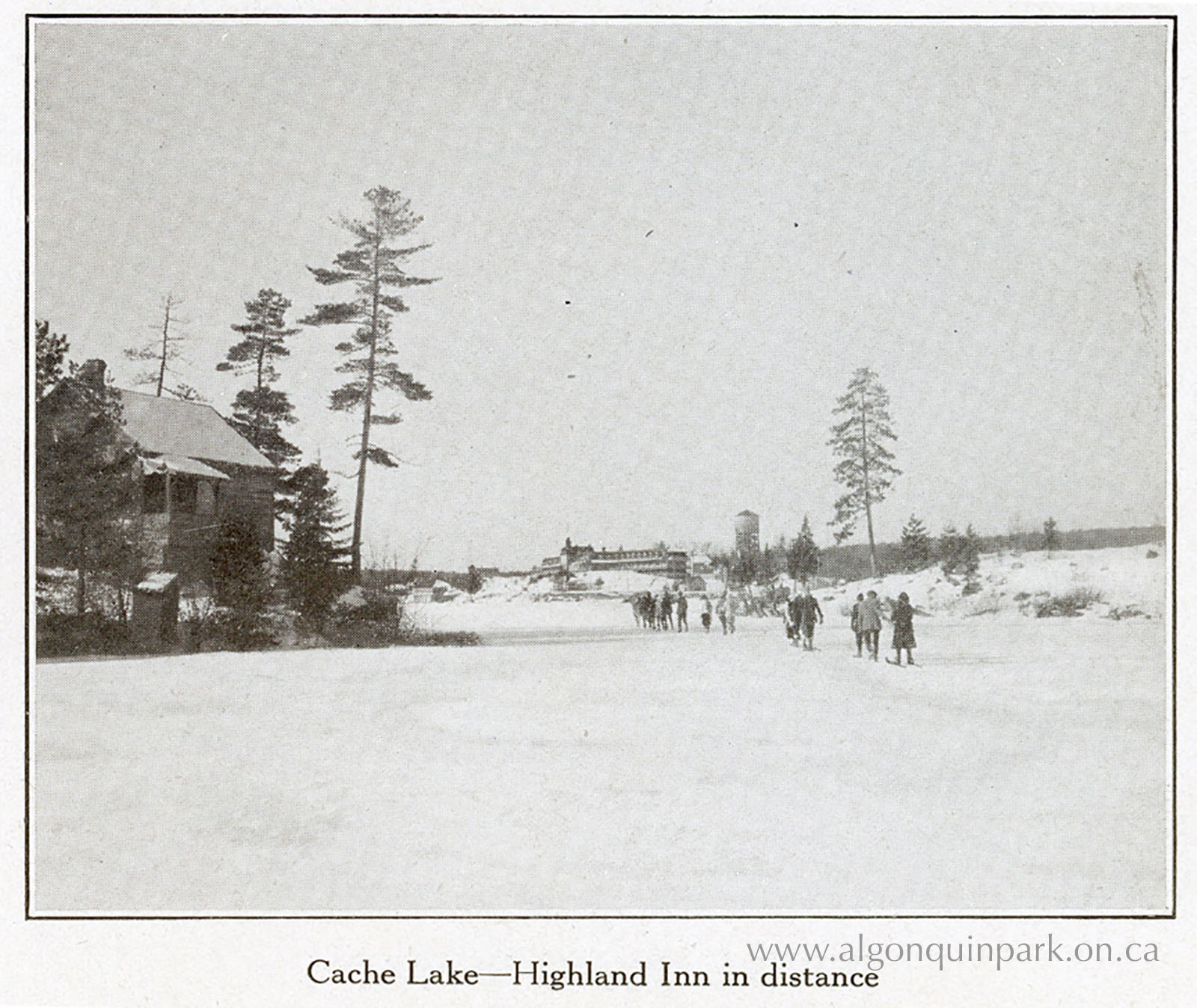A line of guests on snowshoes and skis making their way back to the Highland Inn across the frozen surface of Cache Lake. “Cache Lake – Highland Inn in distance”, in “Enjoy Winter in Ontario Highlands: Algonquin Park Ontario Canada”, 1921-1922. APPAC, 1977.9.1.1, From the Collection of Dr. Duncan A. MacLulich, Donated by M.A. Capstick. 
