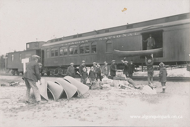 Loading canoes on a Canadian National Railway car in northern Algonquin Park, 1925. APPAC, x2024.4.1-77. 